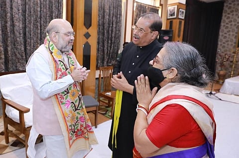 Home Minister Amit Shah meets vocalist Pandit Ajay Chakrabarty at his musical school (Photo | Twitter/@AmitShah)