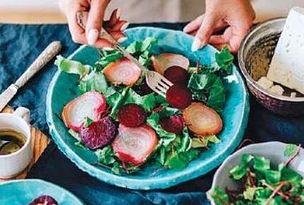 To prevent overeating, eat a small meal before you head to a house party