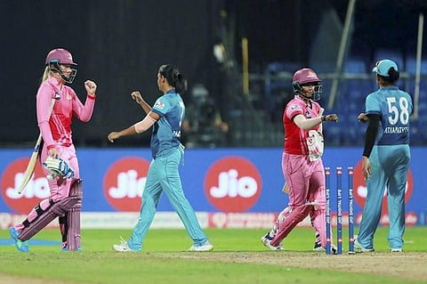 Harmanpreet Kaur C of Supernovas exchanges greetings with Trailblazers players after their match at Women's T20 Challenge 2020 in Sharjah. (Photo | PTI)