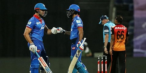 Marcus Stoinis and Shikhar Dhawan of Delhi Capitals celebrate their partnership against SRH. (Photo | ANI)
