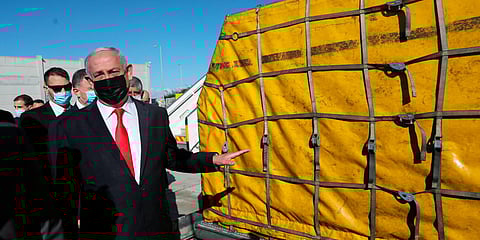 Israeli PM Benjamin Netanyahu attends the arrival of over 100,000 of doses of the Pfizer coronavirus vaccines at the Ben Gurion Airport near Tel Aviv. (File photo| AP)