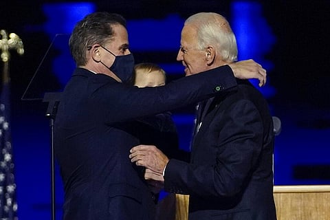 US President-elect Joe Biden (R) with son Hunter Biden (L) (Photo | AP)