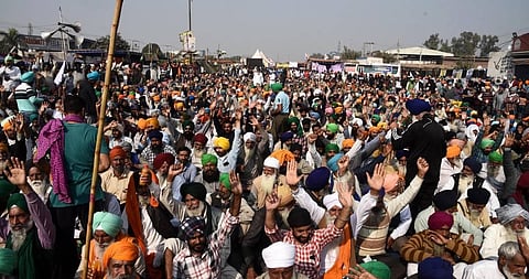 Farmers at the Singhu border during their Delhi Chalo protest against the new farm laws in New Delhi on Thursday. (Photo | Parveen Negi/EPS)