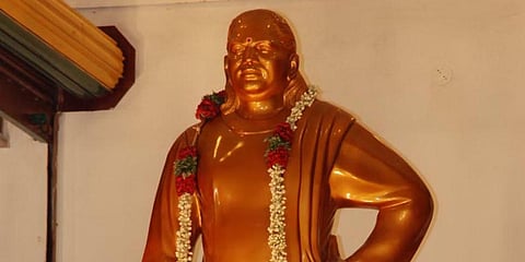 A statue of Pasumpon Muthuramalinga Thevar. 