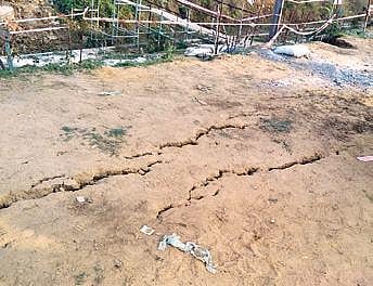 Cracks on Devi river embankment.