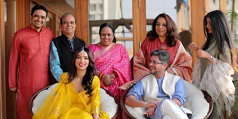 Writers Kanika Dhillon (seated left) and Himanshu Sharma with their families. (Photo| Twitter)