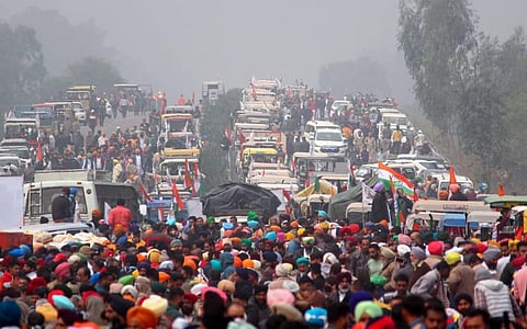 Farmers take part in a protest against the Center's new farm laws at Shambhu border in Patiala District Monday Dec. 14 2020. (Photo | PTI)