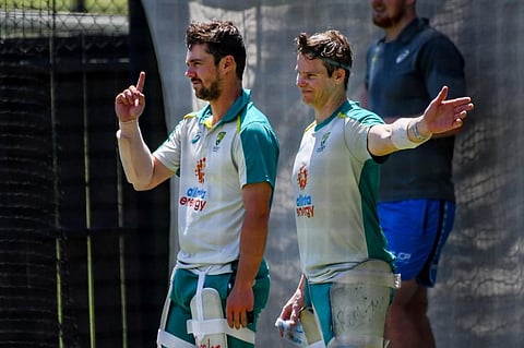Australia's batsmen Steve Smith (R) and Marcus Harris gesture during a practice session in Adelaide. (Photo | AFP)