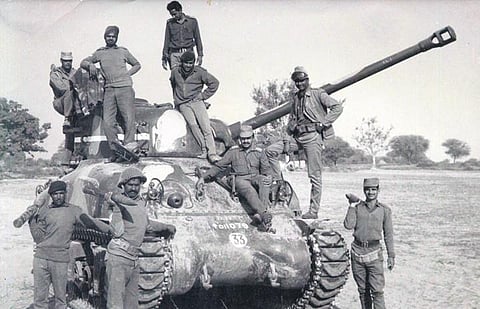 File pictures of fighters posing on a tank during the Liberation War. (Photo | Express)