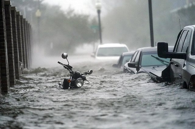 In this September 16, 2020, flood waters move on the street, in Pensacola, Fla. Hurricane Sally made landfall near Gulf Shores, Alabama, as a Category 2 storm, pushing a surge of ocean water onto the coast and dumping torrential rain. This year has seen record Atlantic hurricanes and western wildfires, devastating floods in Asia and Africa and a hot, melting Arctic. It's not just been a disastrous year, but a year of disasters. (Photo | AP)