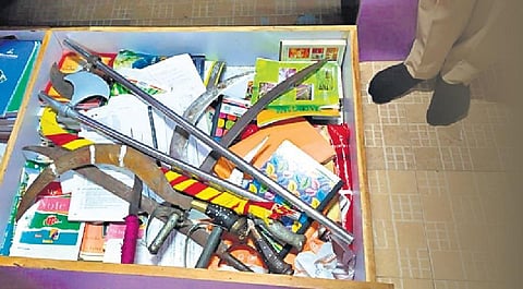 Weapons seized from the house of an accused in Ankalgi.