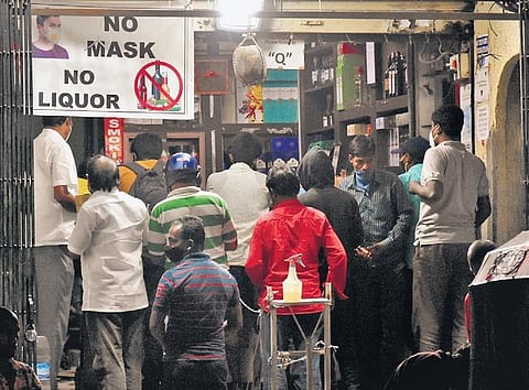 Rush at a wine shop in Hyderabad which reopened after 6 pm on Tuesday