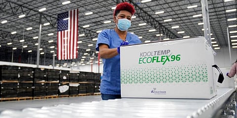 Boxes containing the Moderna COVID-19 vaccine are prepared to be shipped at the McKesson distribution center in Olive Branch. (Photo | AP)