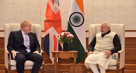 (L) British PM Boris Johnson and (R) PM Narendra Modi (Photo | PTI)
