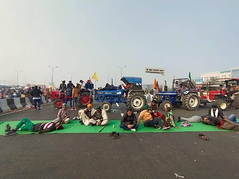 Farmers block a road at Gazipur border during their ongoing agitation against the centre's farm reform laws in New Delhi. (Photo | Parveen Negi/EPS)