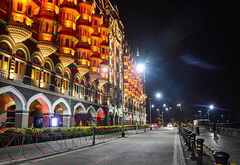 A street near the Gateway of India wears a deserted look during night curfew in Mumbai early Wednesday Dec. 23 2020. (Photo | PTI)