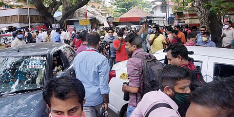 Journalists waiting outside the Vanchiyoor Court for the verdict on Sister Abhaya case. (Photo| Vincent Pulickal, EPS)