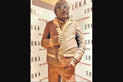 The statue displayed by Zuka, the bakery at Mission Street here, is 5.8 ft tall and weighs 339 kgs. 