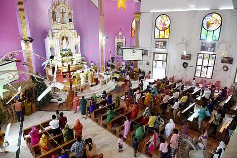 People attend christmas prayer at Sacred Heart Shrine, Egmore, in Chennai. (Photo | R Satish babu, EPS)