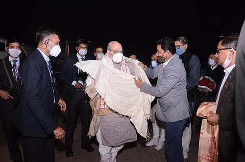 Union Home Minister Amit Shah being welcomed at Guwahati airport on Saturday (Photo | Twitter/@BJP4Assam)
