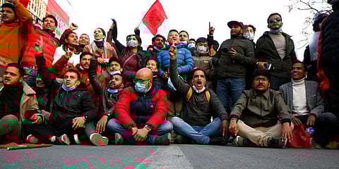 Nepalese students affiliated with Nepal Student Union chant slogans against prime minister Khadga Prasad Oli during a protest in Kathmandu. (Photo | AP)
