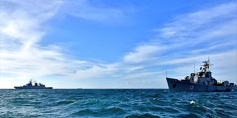 INS Kiltan (L) in a mock drill with a Vietnamese Naval ship. (Photo| Twitter)