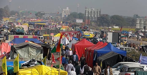 Tent housing and tractor trolleys as farmer remain camped on a blocked Delhi-Jaipur highway in protest against farm laws at at Shahjanpur border in Delhi-Jaipur highway. (Photo | Shekhar Yadav/EPS)