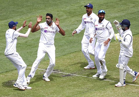 India's Ravichandran Ashwin, second left, celebrates with teammates after dismissing Australia's Marnus Labuschagne. (Photo | AP)