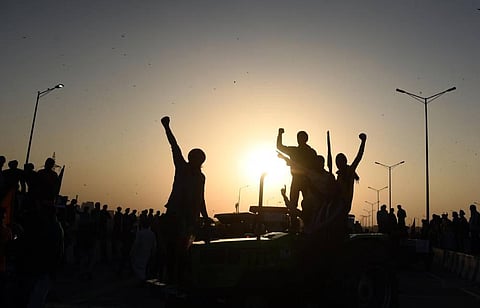 Farmers raise slogans during their protest against the Centers new farm laws at Ghazipur border in New Delhi. (Photo | Parveen Negi/EPS)