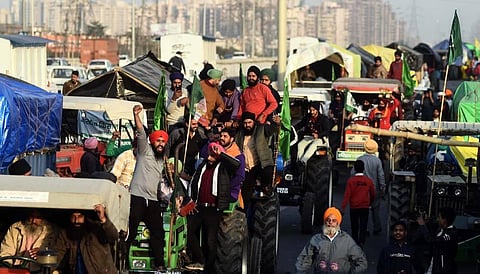 Farmers raise slogans during their protest against the Centers new farm laws at Ghazipur border in New Delhi. (Photo | Parveen Negi/EPS)