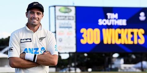 New Zealand bowler Tim Southee poses for a photo as he celebrates his 300th test wicket following play on day four of the first cricket Test against Pakistan at Bay Oval. (Photo | AP)