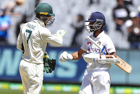 Australian captain Tim Paine, left, congratulates Ajinkya Rahane after India won the second Test at the Melbourne Cricket Ground. (Photo | AP)