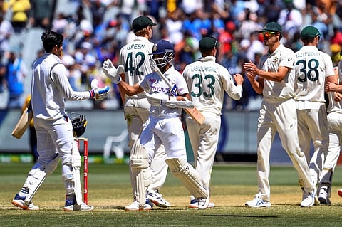 Shubman Gill (L) congratulates team's captain Ajinkya Rahane after victory in the second cricket Test match between Australia and India at the MCG. (Photo | AFP)