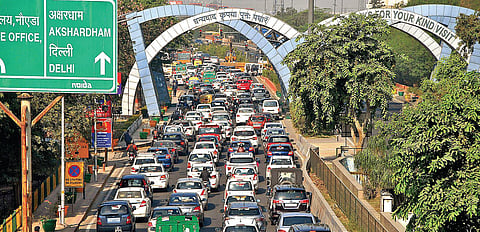 Traffic moves slowly at the Delhi-Noida border due to barricades put up in view of farmers’ agitation. (File Photo | PTI)