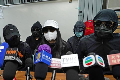Relatives of 12 Hong Kong activists detained at sea by Chinese authorities, attend a press conference earlier this week. (Photo | AP)