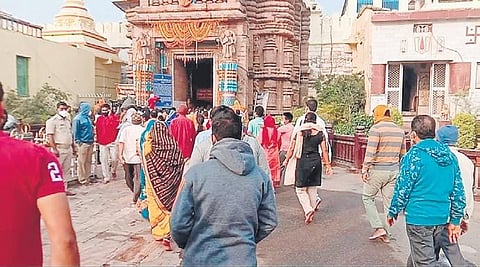 Devotees enter Sri Jagannath temple in Puri after it reopened | Express