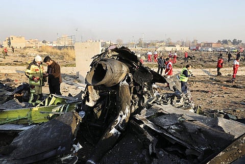 In this Jan. 8, 2020 file photo, debris litters the scene where a Ukrainian plane crashed in Shahedshahr southwest of the capital Tehran, Iran. (Photo | AP)