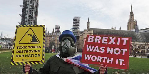 A pro-EU protestor stands in London's Parliament Square during the debateon the EU (Future Relationship) Bill. (File photo| AP)