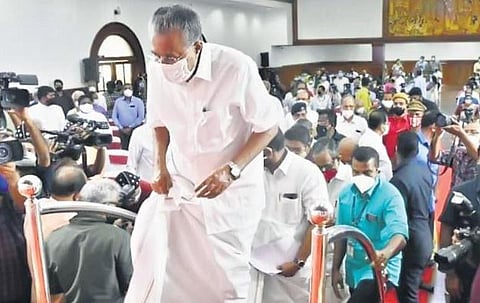 Chief Minister Pinarayi Vijayan gets to the stage at TDM Hall in Kochi during his Kerala Paryadanam meet with prominent personalities on Wednesday | Express