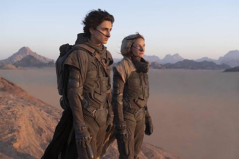 This image released by Warner Bros. Entertainment shows Timothee Chalamet, left, and Rebecca Ferguson in a scene from the upcoming 2021 film 'Dune.'  (Photo | AP)