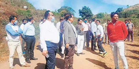 Koraput Collector Madhusudan Mishra and other officials in Sunabeda | Express