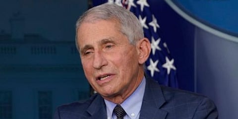 Top US pandemic adviser Anthony Fauci cites near 'vertical' rise in COVID, but sees hope