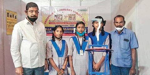 The three innovators and their teachers with the ‘Friendly Stick’ at the summit.