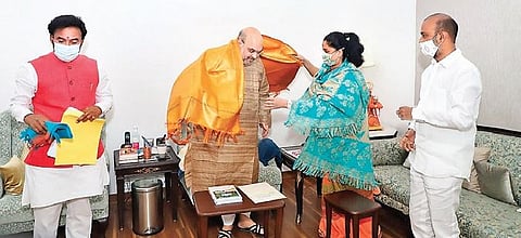 Former MP Vijayashanti greets Union Home Minsiter Amit Shah in New Delhi on Sunday. She joined BJP in the presence of Union Minister of State for Home  G Kishan Reddy and BJP Telangana president Bandi