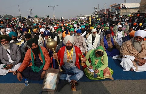 Paralifter Hira singh Sandhu join farmers protest march against the new farm laws at Singhu border in New Delhi on Monday. (Photo | Shekhar Yadav/EPS)