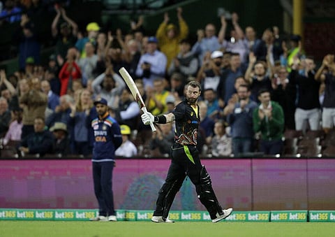 Australia's Matthew Wade raises his bat to acknowledge the applause from the crowd as he leaves the field after losing his wicket. (Photo | AP)