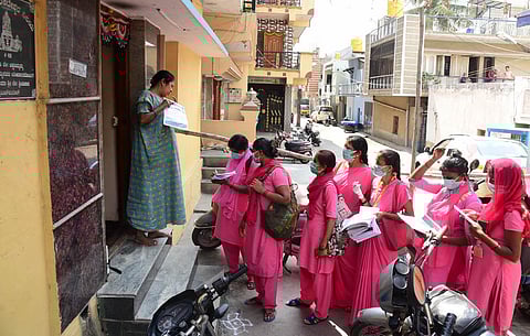 Asha workers taking details from hosue to house during the nationwide lockdown in Bengaluru. (File photo | Vinod Kumar T, EPS)