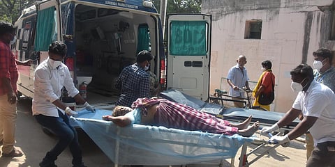 Medical staff shifting a man to the emergency ward who is suffering with mystery illness at government hospital in Eluru on Monday. (Photo| P Ravindra Babu, EPS)