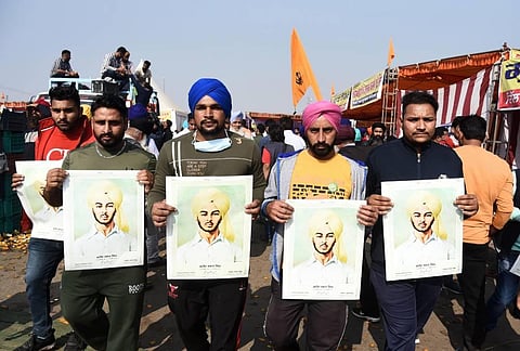 Farmers at Singhu border during their ongoing protest against the Centres farm reform laws in New Delhi Tuesday Dec. 8 2020.  (Photo | Parveen Negi/EPS)