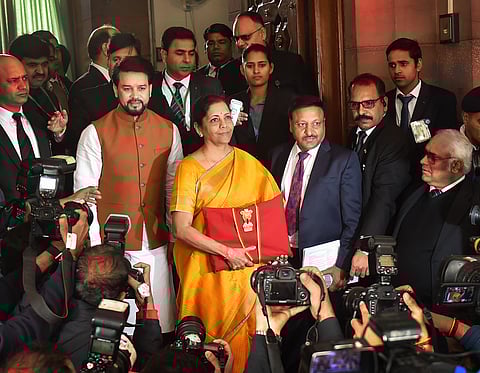 Union Finance Minister Nirmala Sitharaman arrives at parliament house with the Union Budget documents in New Delhi on Saturday. (Photo | PTI)